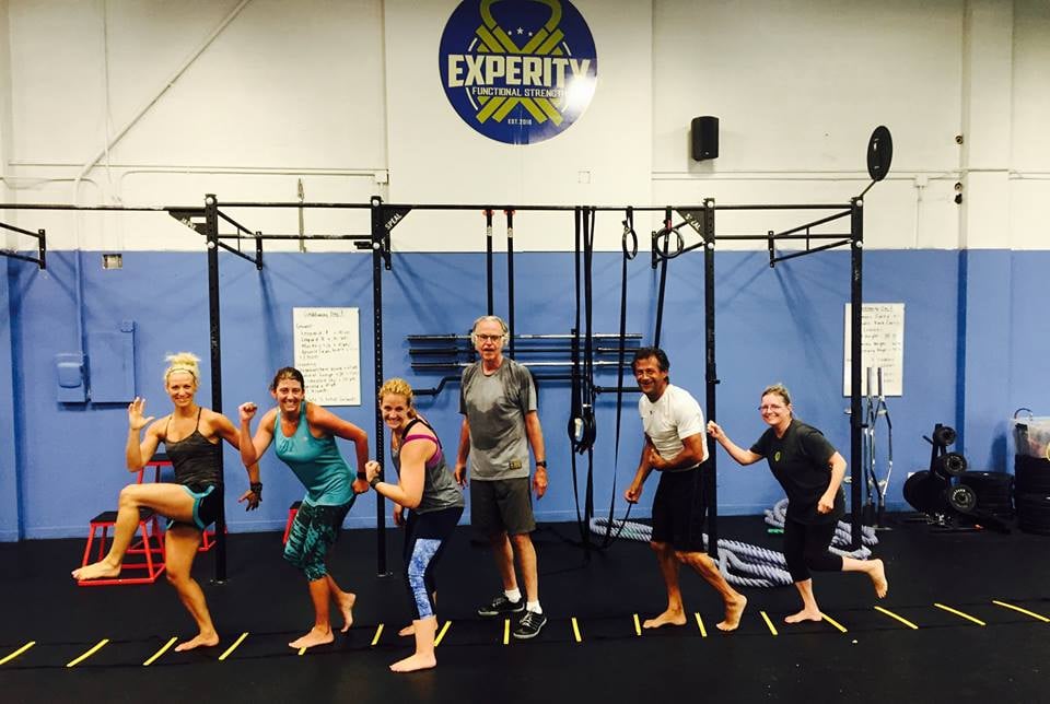 Experity Functional Strength Logo