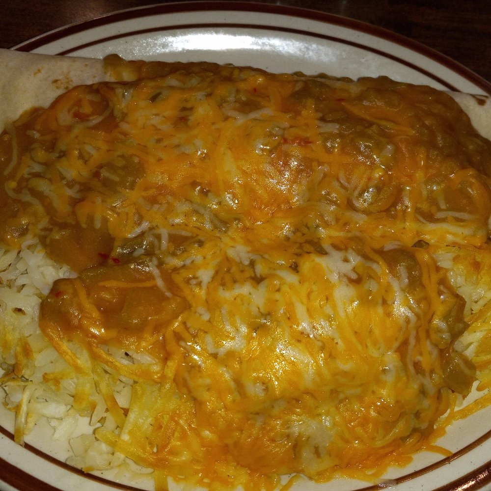 Classic burrito smothered in green Chile sauce. No heat in the sauce and tasteless. Hash browns were soggy. The bacon crumbles tasted fake. Classic burrito smothered in green Chile sauce. No heat in the sauce and tasteless. Hash browns were soggy. The bacon crumbles tasted fake.