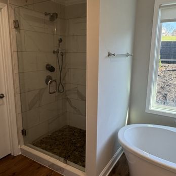 Two Shepherds Cleaning - Glass shower doors cleaned, tile shower, and tub all cleaned to perfection - Home Cleaning Near Me Two Shepherds Cleaning - Glass shower doors cleaned, tile shower, and tub all cleaned to perfection - Home Cleaning Near Me