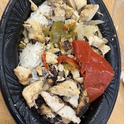 Pollo Tropical - Poorly assembled tropichop bowl with the wrong type of rice