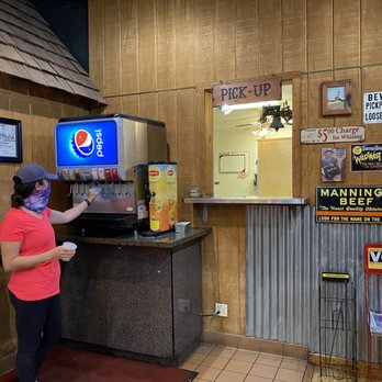 Marshall's Bodacious Bbq - a woman ordering a drink - Barbeque Near Me - Ventura, California Marshall's Bodacious Bbq - a woman ordering a drink - Barbeque Near Me - Ventura, California