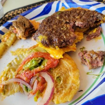 Arby's - This is the cheeseburger deluxe. We threw it in the trash - Fast Food Near Me - Venice, Florida Arby's - This is the cheeseburger deluxe. We threw it in the trash - Fast Food Near Me - Venice, Florida
