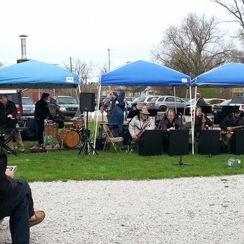 Miller Beach Farmers Market - a group of people sitting under blue tents - Farmers Market Near Me - Gary, Indiana Miller Beach Farmers Market - a group of people sitting under blue tents - Farmers Market Near Me - Gary, Indiana