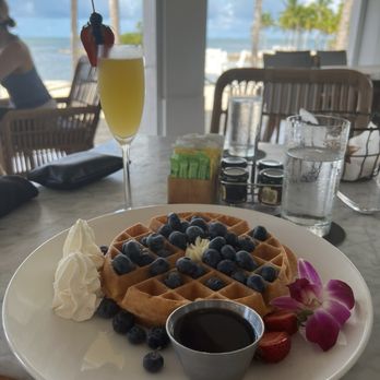 Mahina - Waffle with blueberries and Mimosa - Hawaiian Near Me - Marathon, Florida Mahina - Waffle with blueberries and Mimosa - Hawaiian Near Me - Marathon, Florida