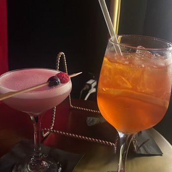 BABs Secret Lounge - Aperol spritz and one of their specialty drinks - Cocktail Bars Near Me - Lutz, Florida BABs Secret Lounge - Aperol spritz and one of their specialty drinks - Cocktail Bars Near Me - Lutz, Florida