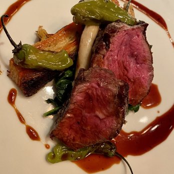 The Elderberry House - BRANDT FARM's BEEF RIBEYE (root vegetable gratin, winter kale, mushrooms, shishito pepper) - French Near Me - Oakhurst, California