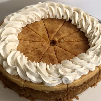 TC Bakery - a cake with white frosting on a white plate - Cupcakes Near Me - Crawfordville, Florida TC Bakery - a cake with white frosting on a white plate - Cupcakes Near Me - Crawfordville, Florida