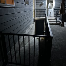 INOX Metalworks - Too dark for justice. Gate and railing to basement. And our porch updated as well.