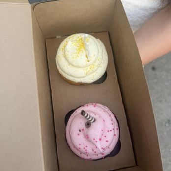 Cupcake Charlie's - Lemon cupcake (top) and chocolate raspberry surprise cupcake (bottom) - Bakeries Near Me - Newport, Rhode Island