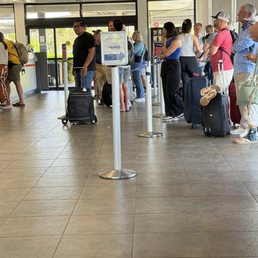 Long lines at Budget/Payless car rental, Lihue, Kauai.