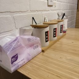 Spices and call button, sanitizer, tissues