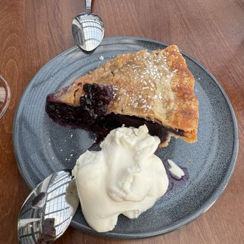 Blueberry pie with homemade whipped cream