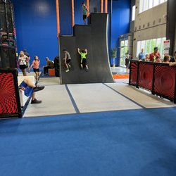 Adrenaline Family Adventure Park - Like ninja warrior !! So many cool things to do!  Here's their version of Warped wall  It was awesome !