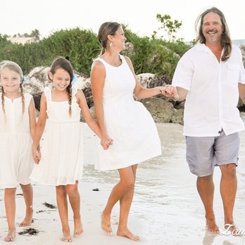 Scott's Home Repair & Construction - a family walking on the beach - Handyman Near Me Scott's Home Repair & Construction - a family walking on the beach - Handyman Near Me