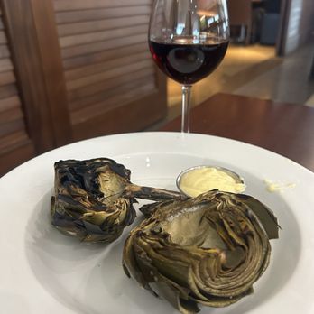 Esquire Grill - Grilled artichoke and Pinot noir. - American Near Me - Sacramento, California
