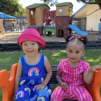 Action Day Schools - Phelan - Seesawing with friends - Child Care & Day Care Near Me - San Jose, California Action Day Schools - Phelan - Seesawing with friends - Child Care & Day Care Near Me - San Jose, California