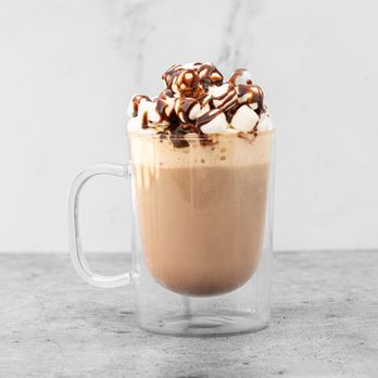 Itchy Monkey Craft Coffee - a cup of coffee with whipped cream and chocolate - Coffee & Tea Near Me - Brooksville, Florida
