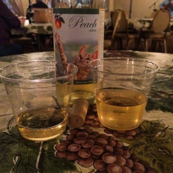 Greenhouse Winery - Trying the Peach wine - Venues & Event Spaces Near Me - Irwin, Pennsylvania