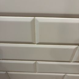 Wall next to dryer