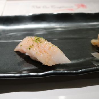 Sushi Ryusei - Japanese white fish with shaved yuzu - Sushi Bars Near Me - New York, New York Sushi Ryusei - Japanese white fish with shaved yuzu - Sushi Bars Near Me - New York, New York