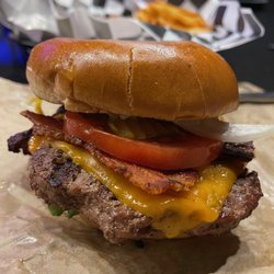 The Austin Eagle - Eagle Nest, a half-pound Angus burger with Texas cut bacon and a fried egg.