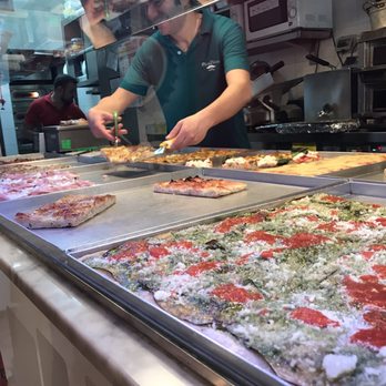 Pizza Zizza - All smiles cutting my pizza squares - Pizza Near Me - Rome, RM