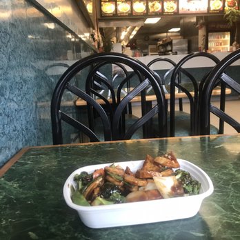 A New Hong Kong - a bowl of food on a table - Chinese Near Me - Martins Ferry, Ohio
