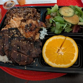 Teriyaki City Grill - Bento box with ribeye steak, grilled chicken, and short ribs. Salad and fruit on the side. - Japanese Near Me - Hayward, California Teriyaki City Grill - Bento box with ribeye steak, grilled chicken, and short ribs. Salad and fruit on the side. - Japanese Near Me - Hayward, California