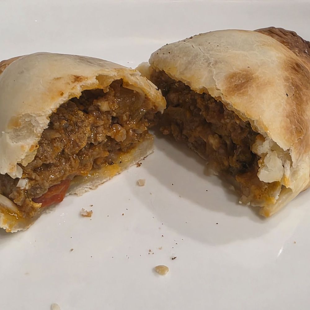 El Patio - Empanada (Beef) - June 2026. I cut it in half. - Argentine Near Me - Rockville, Maryland El Patio - Empanada (Beef) - June 2026. I cut it in half. - Argentine Near Me - Rockville, Maryland