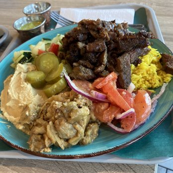 Yalla Teaneck - a plate of food on a tray - Kosher Near Me - Teaneck, New Jersey Yalla Teaneck - a plate of food on a tray - Kosher Near Me - Teaneck, New Jersey