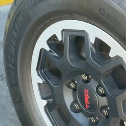 All black and rims were damaged with grease stains.