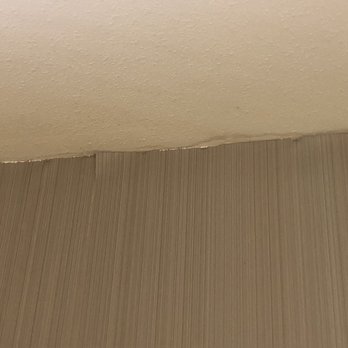Courtyard by Marriott Hammond - Where the walk meets the ceiling was lots of warping. That could also be a mildew source. - Hotels Near Me - Hammond, Louisiana