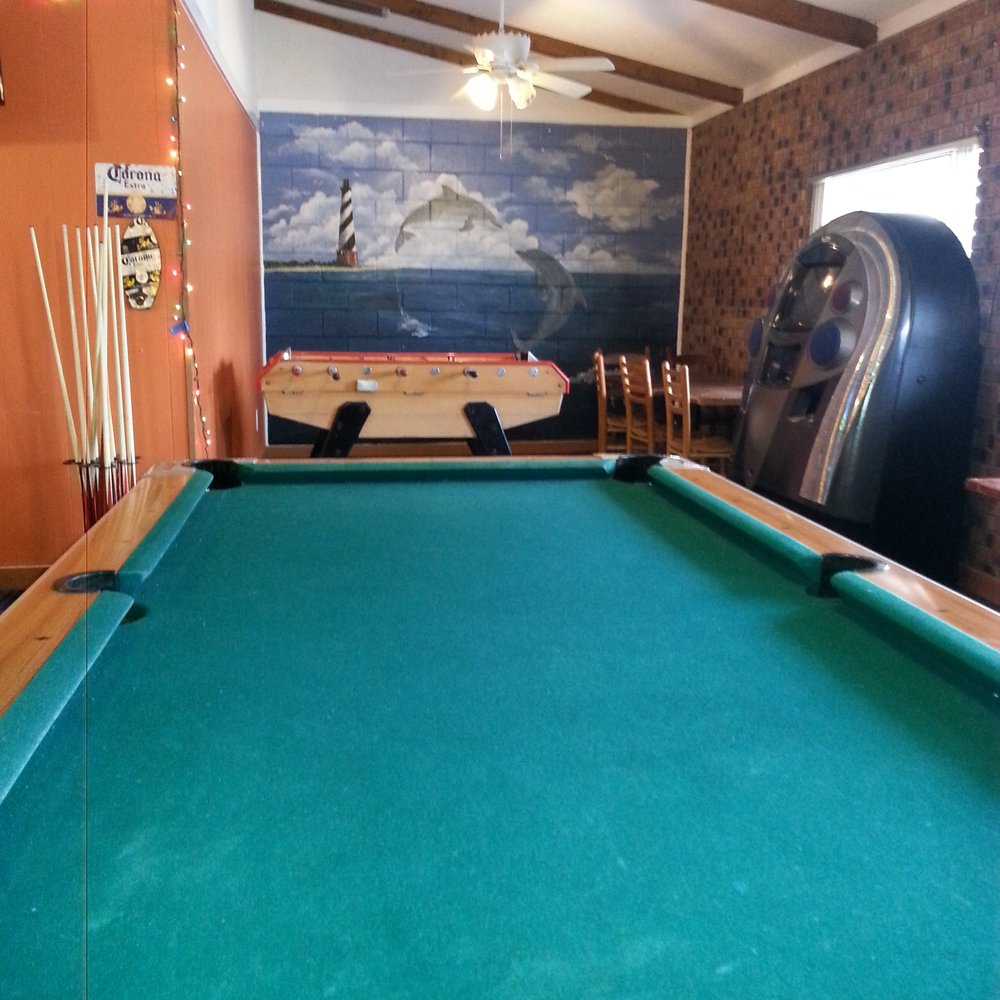 La Bella Airosa - a pool table in a living room - Mexican Near Me - Wilmington, North Carolina