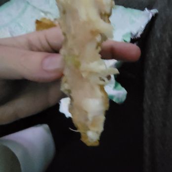 Arby's - a person holding a piece of food - Sandwiches Near Me - Colorado Springs, Colorado