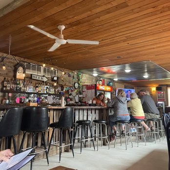 Escape on 2nd Ave - people sitting at a bar - Tacos Near Me - Clayton, Wisconsin