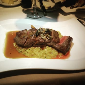 Canoe - Australian lamb on a bed of carrot risotto - New American Near Me - Atlanta, Georgia Canoe - Australian lamb on a bed of carrot risotto - New American Near Me - Atlanta, Georgia