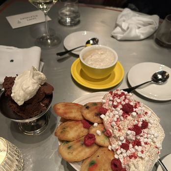 Quality Bistro - Desserts! Birthday buttercream and madeleines (front), chocolate mousse (left), espresso creme brûlée (back) - French Near Me - New York, New York