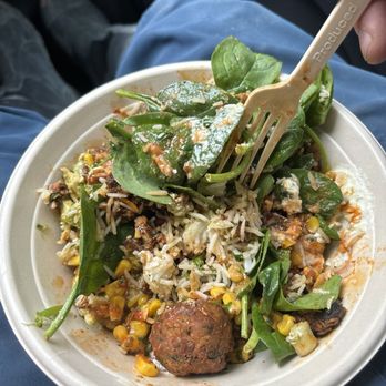 CAVA - Greens and grain bowl with spicy chicken and falafel. - Mediterranean Near Me - New York, New York CAVA - Greens and grain bowl with spicy chicken and falafel. - Mediterranean Near Me - New York, New York