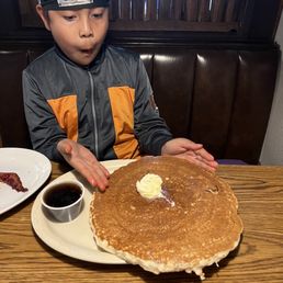 Biggest pancake my son has ever had! He only ate half, you could really share this with 2 ppl. Biggest pancake my son has ever had! He only ate half, you could really share this with 2 ppl.