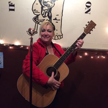 Rogue Brew Pub & Eatery - So,I don't play guitar lol!! But they let me pose for this pic,with expensive guitar,as a joke!! Who does this?! The Rogue:)! - Brewpubs Near Me - North Plains, Oregon