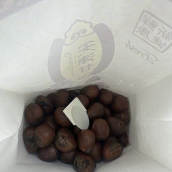 Anson Trading Co Roasted Chestnuts - Roasted chestnuts with scoop spatula - Street Vendors Near Me - San Jose, California Anson Trading Co Roasted Chestnuts - Roasted chestnuts with scoop spatula - Street Vendors Near Me - San Jose, California
