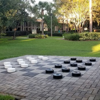 DoubleTree by Hilton - Lush landscape and checkerboard - Hotels Near Me - Orlando, Florida DoubleTree by Hilton - Lush landscape and checkerboard - Hotels Near Me - Orlando, Florida
