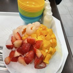 Medium shaved Oct with fresh mango, fresh strawberries, fresh lychee, and mango mochi. Medium shaved Oct with fresh mango, fresh strawberries, fresh lychee, and mango mochi.