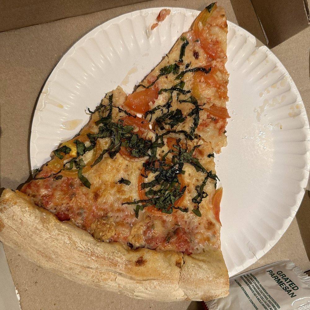 Roppolo's Pizzeria - Margherita slice - Pizza Near Me - Austin, Texas Roppolo's Pizzeria - Margherita slice - Pizza Near Me - Austin, Texas
