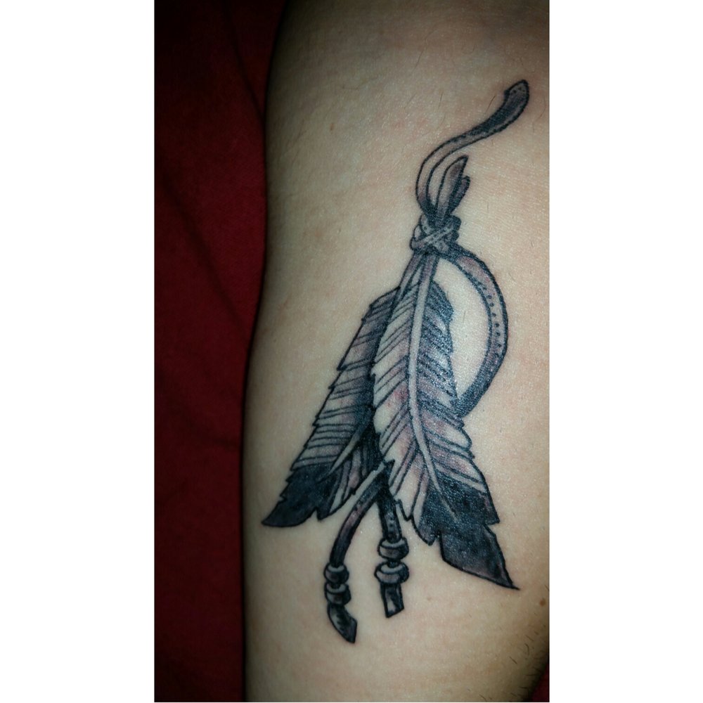 Feathers to represent my indian side Feathers to represent my indian side