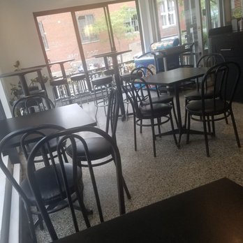 Café District - tables and chairs in a restaurant - Coffee & Tea Near Me - Montreal, Quebec