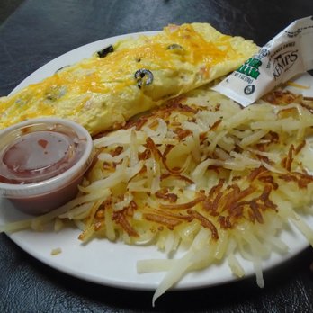 Next Door Cafe - Mexican omelette with hash browns - under cooked hash browns - bummer. - New American Near Me - New Richmond, Wisconsin Next Door Cafe - Mexican omelette with hash browns - under cooked hash browns - bummer. - New American Near Me - New Richmond, Wisconsin