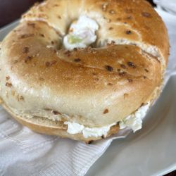 Fresh Cup Cafe - Onion bagel with veggie cream cheese