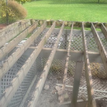 GM Construction - Old deck being torn down with ugly lattice work - Decks & Railing Near Me - Howell, Michigan