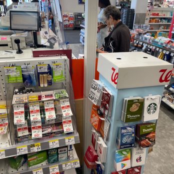 Walgreens - a man in a face mask in a store - Drugstores Near Me - Los Angeles, California Walgreens - a man in a face mask in a store - Drugstores Near Me - Los Angeles, California